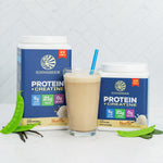 Sunwarrior vanilla protein and creatine powder containers with a smoothie in a glass and green leaves nearby