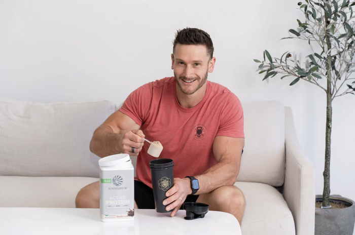 a man with a scope of protein powder